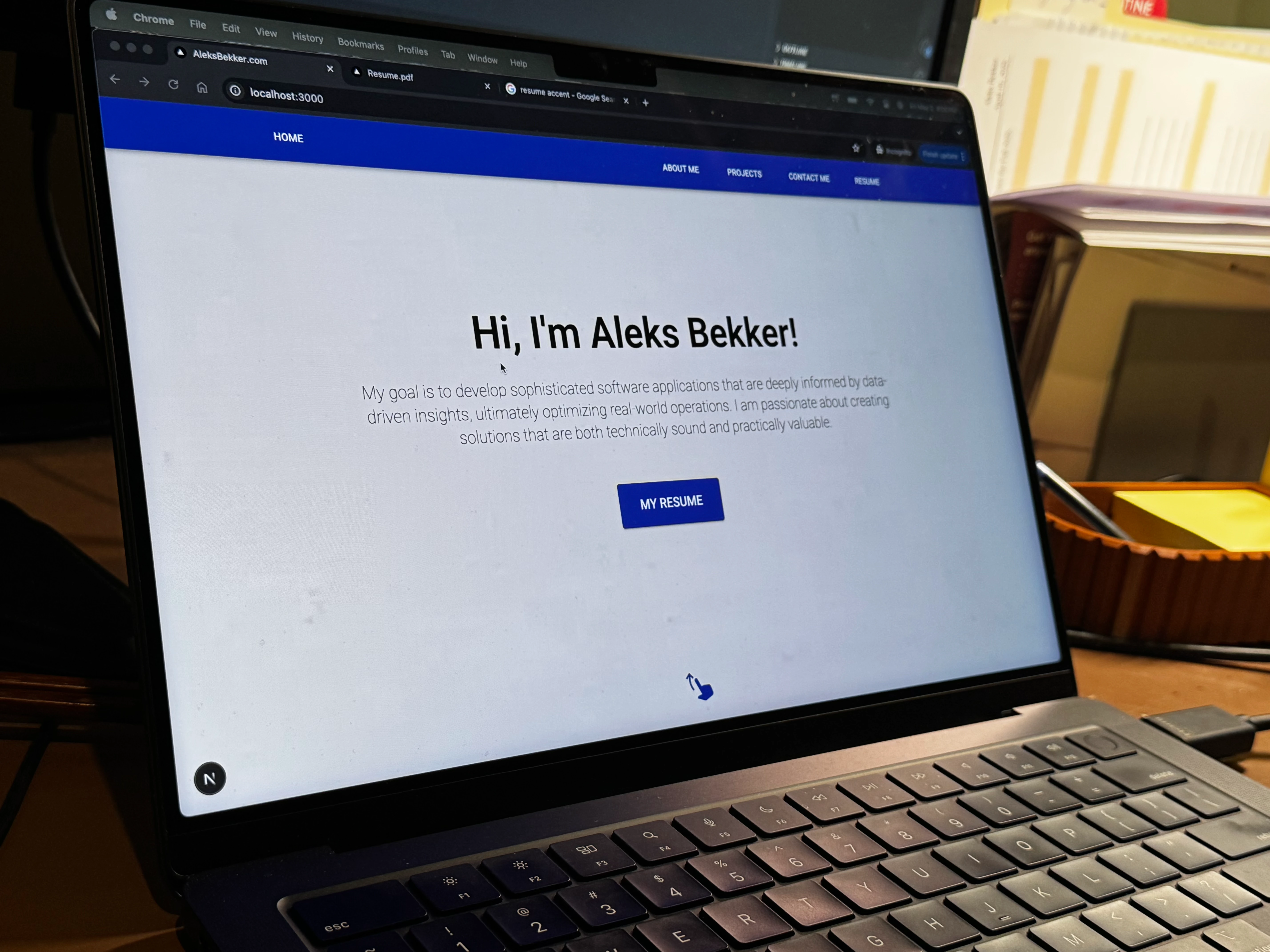 A photo of this site on a laptop
